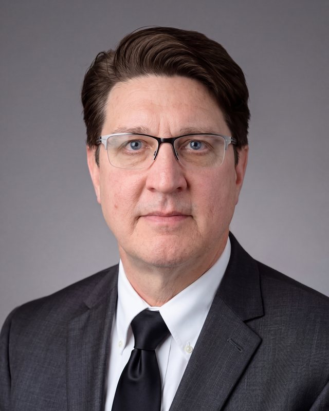 Portrait of Jason White, Senior Partner