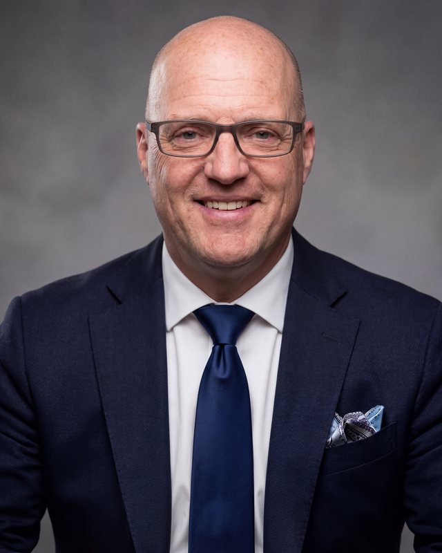 Portrait of John Prescott, Founder & Managing Partner